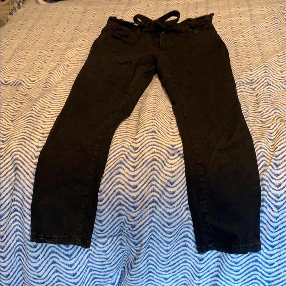 Black paper bag skinny jeans.